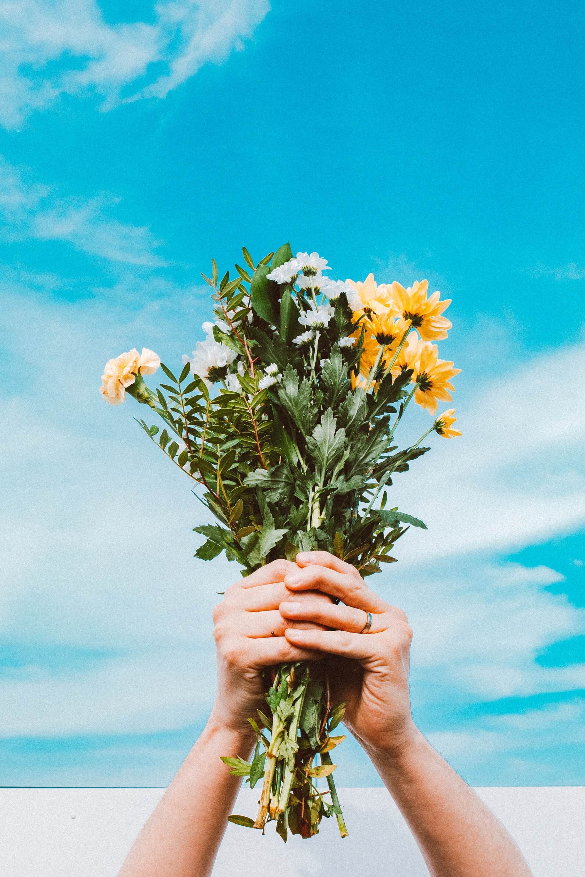 flowers being held