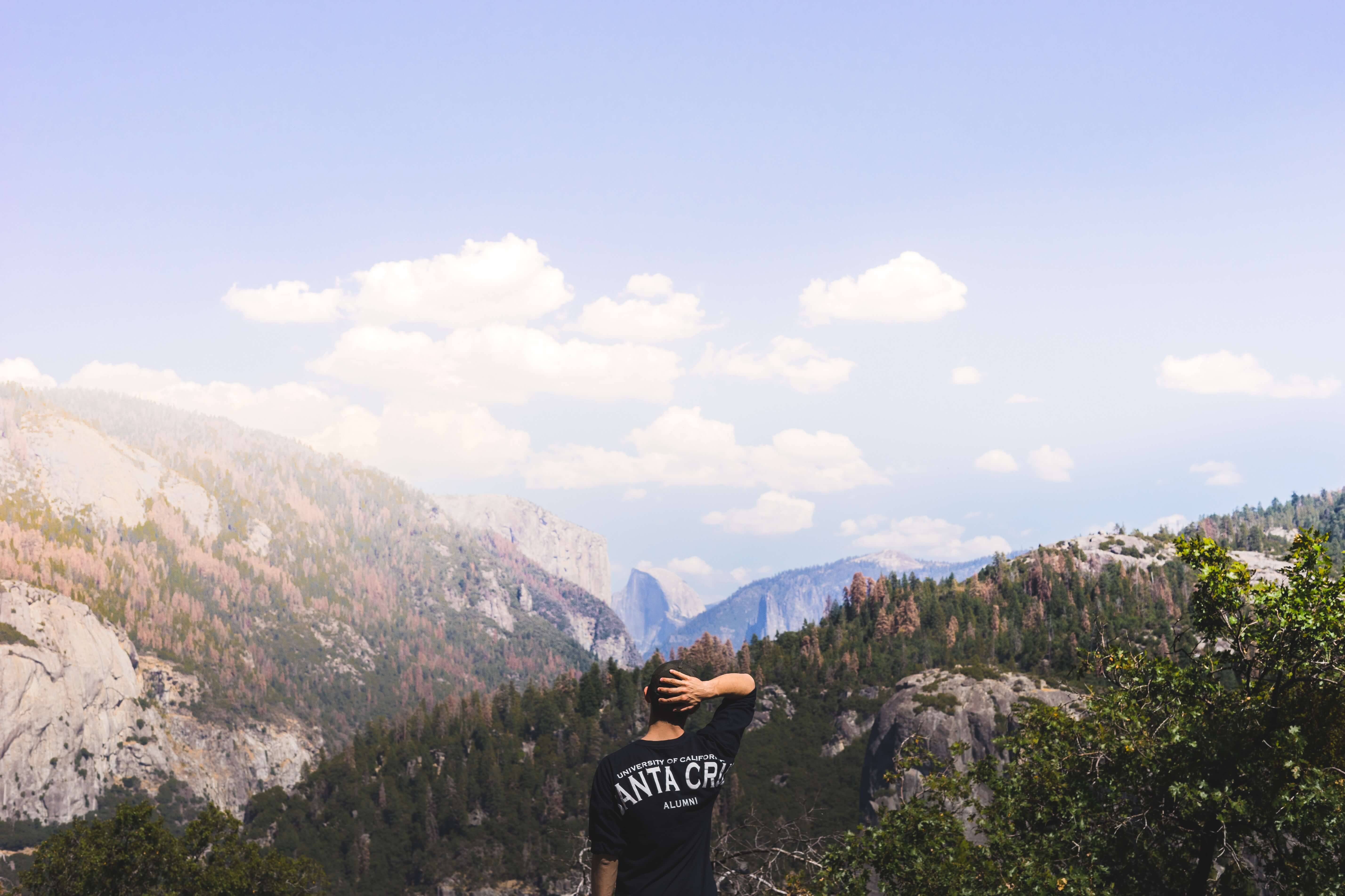 man looking at mountain