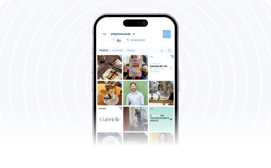 A smartphone screen displays a social media management app with posts, stories, and reels, showing various images and tips for improving business rankings. The username "@flipthetabledk" is visible at the top, highlighting the use of a social media scheduler. | plannthat.com